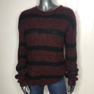 Red and black striped sweater.